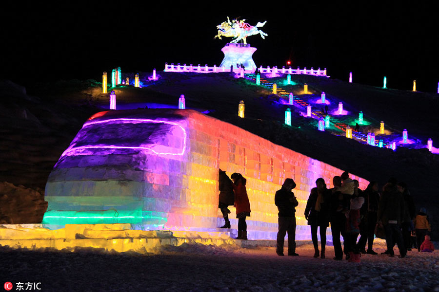 Ice sculptures light up Altay in Xinjiang