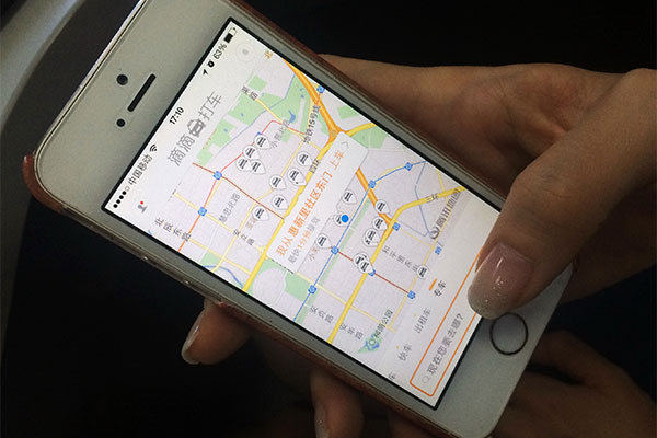 Taxi crackdown ensnares Didi Kuaidi app service