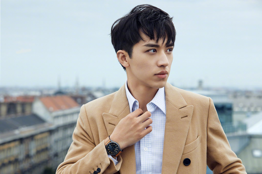 Actor Xu Weizhou poses for fashion magazine