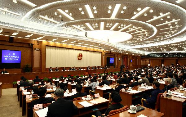 China's parliament adopts state compensation law