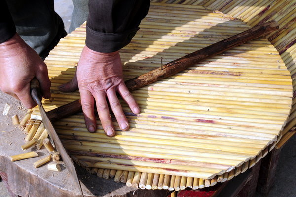 Village known for sorghum stalk boards