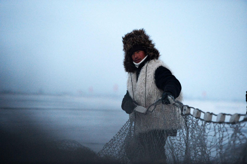 Ancient fishing ritual held on frozen river