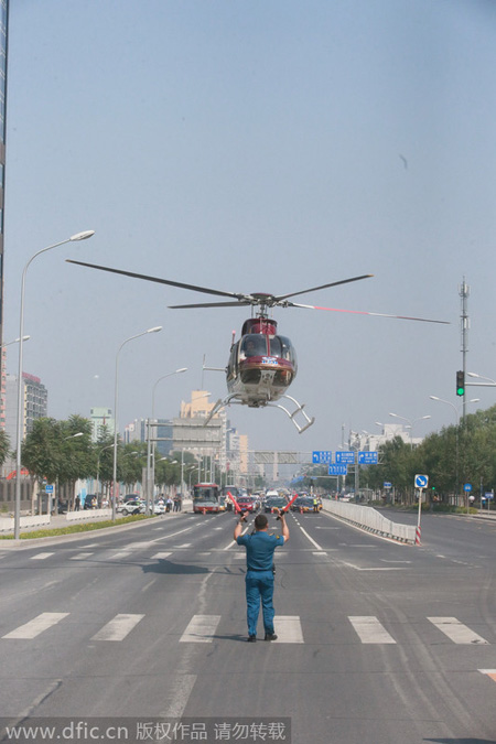 Road in downtown Beijing closed for medical helicopter