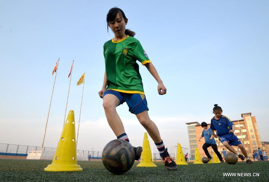 Chinese young girls from Hebei rule soccer fields