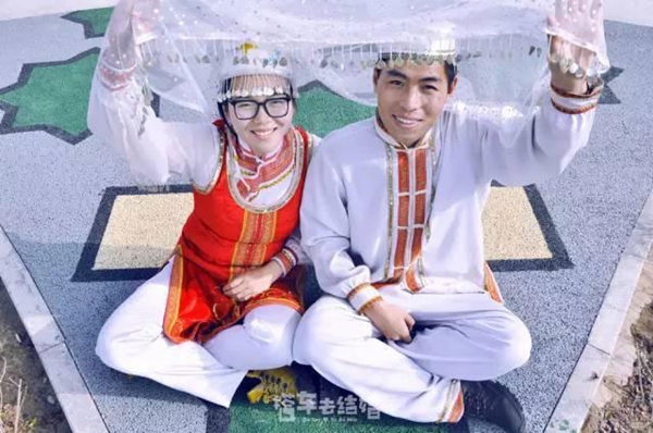 Couple on epic wedding trip to don 56 ethnic costumes