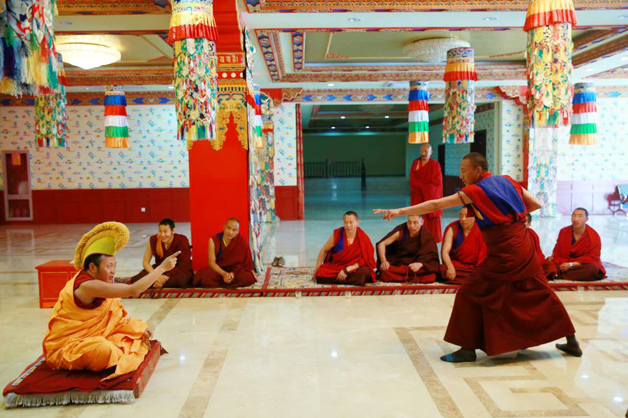 Tibetan Buddhists prime for debate test