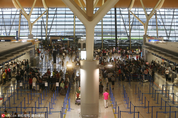 Homemade bombs hurt four at Shanghai airport