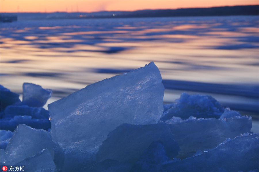 Ice sparkles under dazzling colors in Heilongjiang