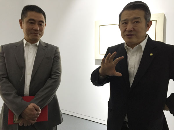 Wuhan University exhibits artwork from alumni