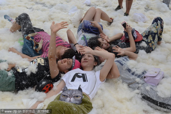 Feathers fly as pillow fight relieves stress of daily life