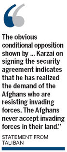 Taliban supports Karzai's delaying US security deal