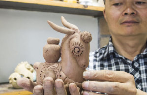 Black pottery art shines in Guantao