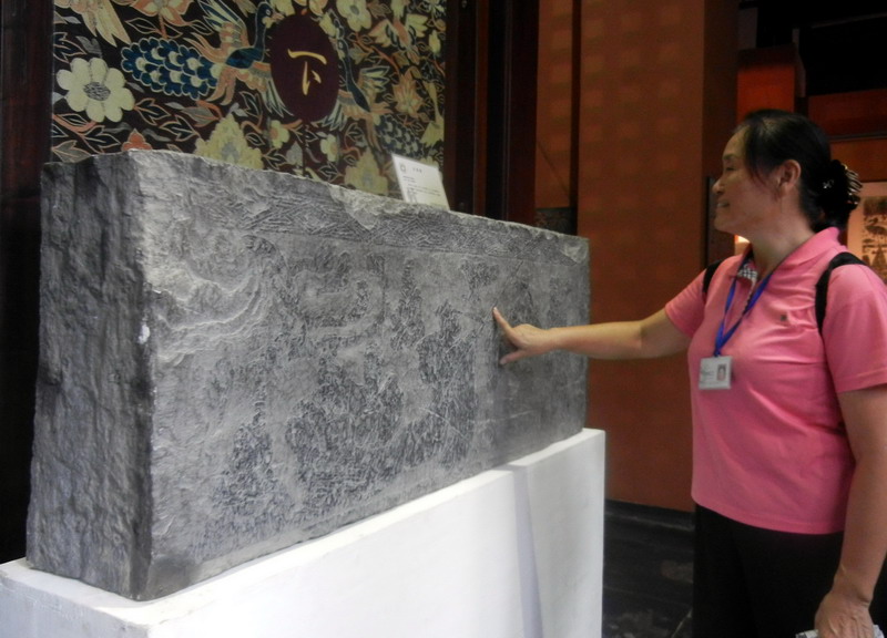 Han stone engraving art displayed in Suzhou