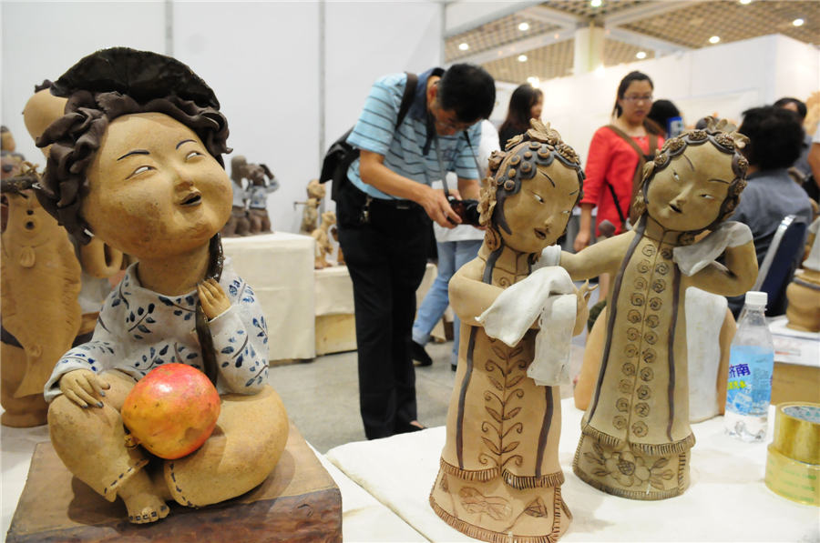 Vivid pottery figurines exhibited in Shandong