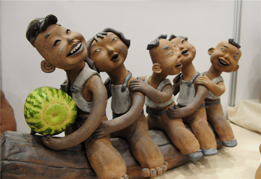 Vivid pottery figurines exhibited in Shandong