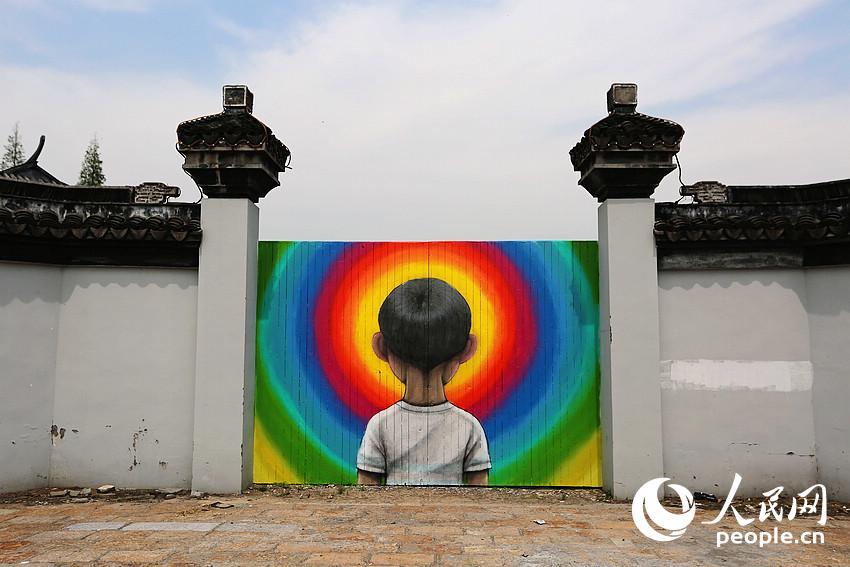 French street artist beautifies cottages in Shanghai