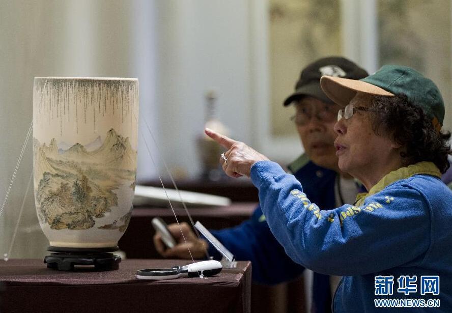 Miniature calligraphy on porcelain displayed in Canada