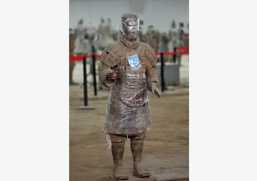 Terracotta warriors wrapped in cling film