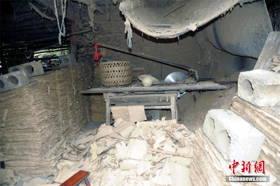 Water wheel keeps on turning at old papermaking workshop