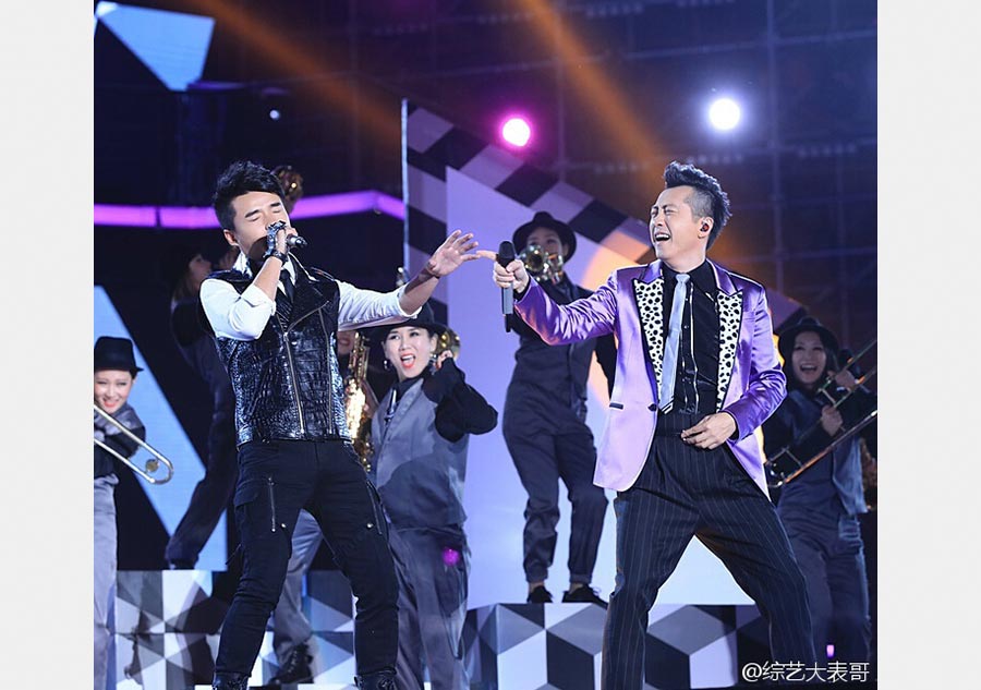 Zhang Lei wins fourth season of <EM>Voice of China</EM>