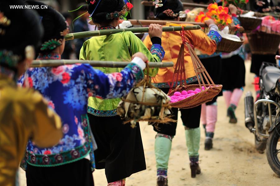 Miao women dress up to celebrate Spring Festival