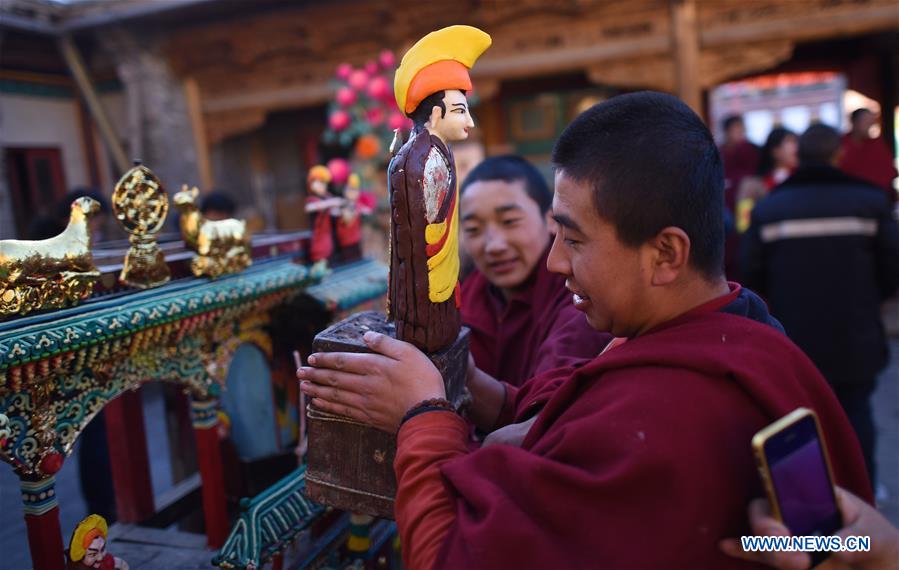 Butter sculptures of Buddha figurines exhibited at Taer Monastery