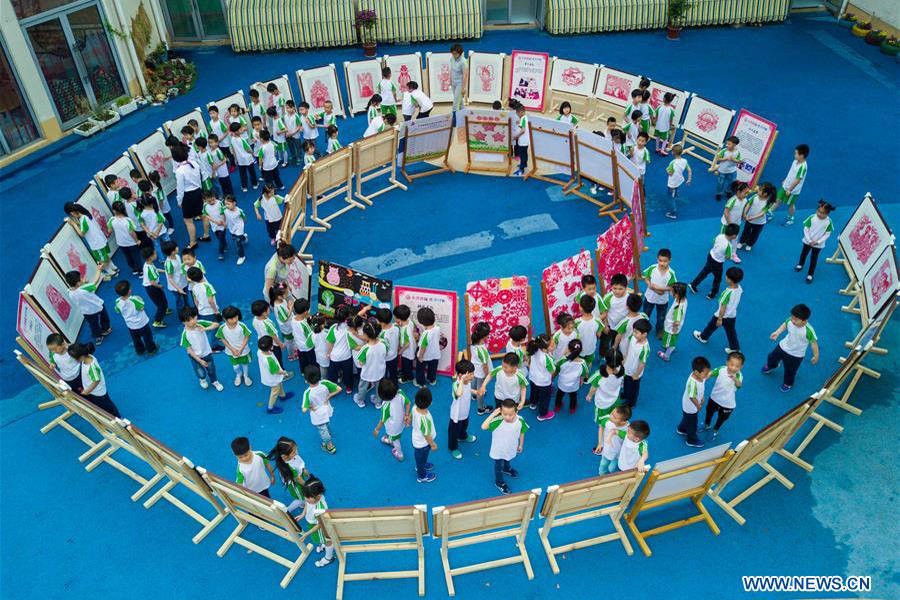 Children attend intangible cultural heritage activity in Zhejiang province