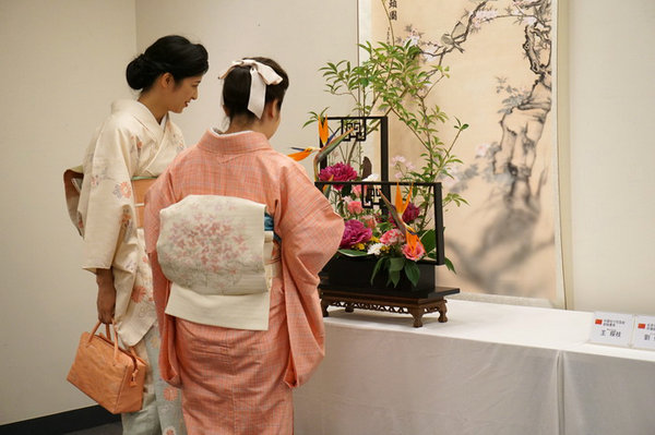 China, Japan and South Korea artists arrange flowers in summer