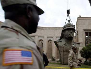 Giant Saddam bust dismantled