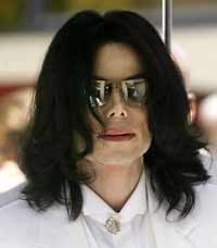 Michael Jackson is expected to come face to face this week, for the first time since his arrest, with the mother of the teenage boy who accuses him of molestation. The woman has been subpoenaed to testify on Sept. 17, 2004 by Jackson's attorneys as they seek to suppress evidence seized from Neverland, Jackson's central California ranch, and from the offices of a private investigator working for Jackson's former lawyer. Jackson is shown at the courthouse in Santa Maria, California August 16. [Reuters]