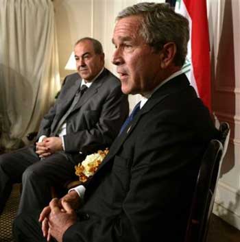 US President Bush, right, meets with Iraq's interim Prime Minister Ayad Allawi on the sidelines of the United Nations General Assembly in New York Tuesday, Sept. 21, 2004. Bush is getting ready to ask Congress for another $80 billion for conflicts in Iraq and Afghanistan, as budget analysts prepare new estimates of the federal deficits that would have loomed even without the wars. [AP]