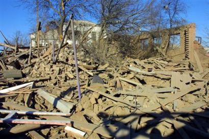 A general view of what is left of the house, where rebel leader Aslan Maskhadov was killed last week in Tolstoy-Yurt, a village in the northern sector of Chechnya (news - web sites), Monday, March 14, 2005. Authorities have blown up the house where rebel leader Aslan Maskhadov was killed last week in a special operation, witnesses and officials said Monday. It was unclear whether the explosion Sunday was meant as punishment for the family that allegedly gave him shelter, a safety precaution or an attempt to cover up sensitive evidence. (AP Photo/Musa Sadulayev) 