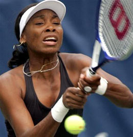 Venus Williams returns a shot to Marta Domachowska during their match at the Bausch and Lomb Championships, Thursday, April 7, 2005, in Amelia Island, Fla. [AP]