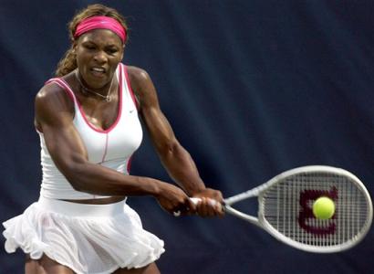 Serena Williams returns a shot to Silvia Farina Elia during their match at the Bausch and Lomb Championships, Friday, April 8, 2005, in Amelia Island, Fla. Due to a weather delay on Thursday, it was Williams' second match of the day. Williams is seeded second.(AP Photo/Phil Coale) 