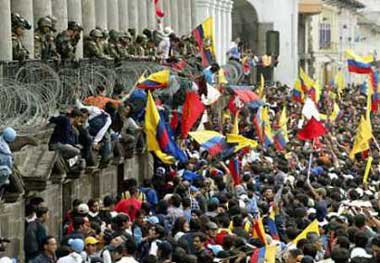 Thousands of Ecuadorans demonstrate in front of Carondelet Palace after President Lucio Gutierrez was fired by the Congress, in Quito, April 20, 2005. A total of 60 congressmen from the 100-seat chamber voted to fire Gutierrez for 'abandoning his post' and named Vice President Alfredo Palacio in his place. 