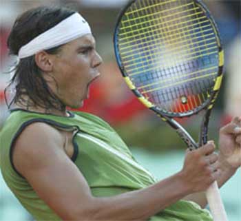 Spain's Rafael Nadal reacts as he plays Switzerland's Roger Federer during their semifinal of the French Open tennis tournament, Friday, in Paris. (AP