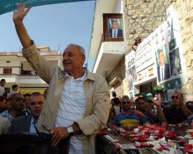 Lebanese parliament house speaker and head of the Shi'ite Amal Movement, Nabih Berri, waves at a polling station in Tebnin village, south Lebanon June 5, 2005. Voters went to the polls in south Lebanon on Sunday where Syria's staunchest allies Hizbollah and Amal were set to triumph in the first general elections since Syrian troops left the country. REUTERS