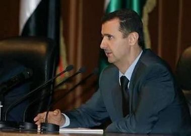 Syrian President Bashar al-Assad speaks at Baath Party congress in Damascus June 9, 2005. Syria cannot imagine a scenario that would warrant moving its troops back to Lebanon, and will avoid giving the United States any such 'pretext' to attack, Syria's ambassador to Washington said on June 13 2005. [Reuters/file] 