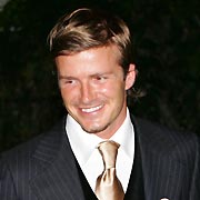 England's soccer captain David Beckham leaves a dinner reception at the British High Commissioner's residence in Singapore July 4, 2005. Paris, London, Madrid, New York City and Moscow are competing to win the right to host the 2012 Summer Olympic Games in an IOC vote which will be held on July 6 in Singapore. Beckham is in town to support London's bid. [Reuters]