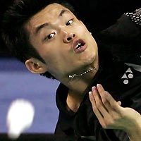 World number one Lin Dan of China hits a shot to Peter Gade of Denmark during his win in the semi-finals of the IBF World Badminton Championships in Anaheim, California, August 20, 2005. Lin won 15-9 13-15 15-11.