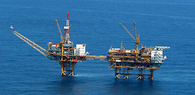 An aerial view shows gas drilling rigs at China's Tianwaitian field in Japan and China's disputed East China Sea border in this handout picture by Japan Maritime Self-Defense Force taken September 19, 2005.