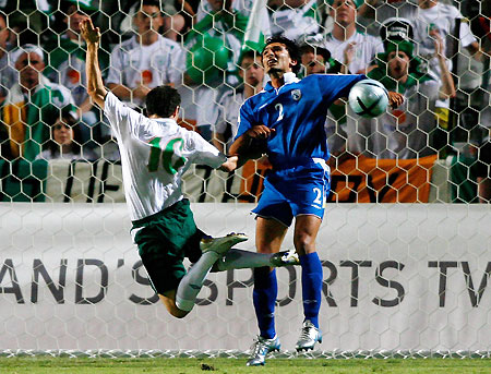 Ireland's Robbie Keane (L) is denied a goal on the line by Louka Louicas of Cyprus during their World Cup 2006, Group Four, qualifying soccer match at GSP stadium in Nicosia October 8, 2005.