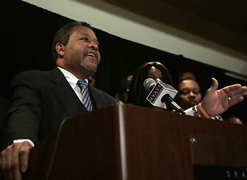 Roger Toussant, President of Transit Workers Union Local 100, speaks to reporters at a news conference in New York December 21, 2005.