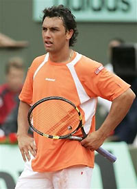 Argentina's Mariano Puerta reacts as he plays Spain's Rafael Nadal during their final match of the French Open tennis tournament, at the Roland Garros stadium in Paris, Sunday June 5, 2005.