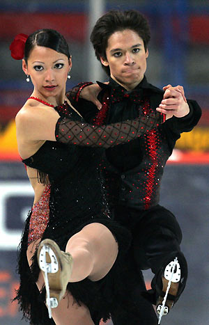 hristina Beier (L) and William Beier perform to the Yankee Polka in the ice dancing Compulsory Dance during the German Figure Skating Championships in Berlin December 27, 2005.