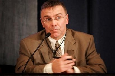 Craig Jenness, a United Nations official addresses a news conference organized by the Independent Electoral Commission of Iraq, or IECI, in Baghdad, Iraq, Wednesday Dec. 28, 2005, saying that the U.N.-led international election assistance team found the Dec. 15 contested elections for Iraq's new parliament as credible