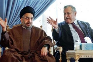 Iraqi President Jalal Talabani, Iraq's Kurd president, right, holds talks at his Lake Dokan retreat in the Kurdish north with Abdul Aziz al-Hakim, left, the cleric who heads the United Iraqi Alliance, near Suleymania, Thursday Dec. 29, 2005.