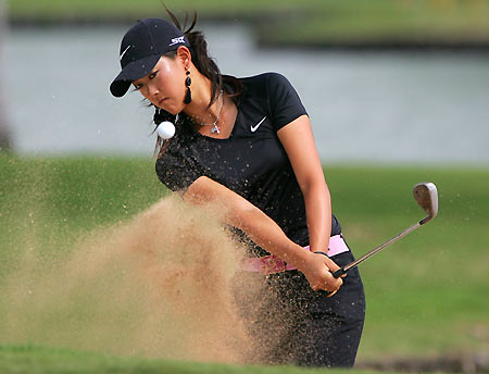 Michelle Wie of the U.S. tees off of the first hole at the Waialae Country Club during the second round of the Sony Open golf tournament in Honolulu, Hawaii January 13, 2006. [Reuters]