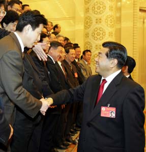 Jia Qinglin meets with newly-elected members of CPPCC