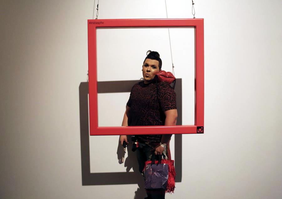 Fashionistas pose during Sao Paulo Fashion Week